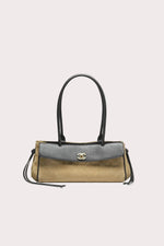 Chanel Urban Essential East West tote with dark beige quilted suede body, black pebbled calfskin flap, gold CC turnlock, and long shoulder straps. From Matthieu Blazy collection.