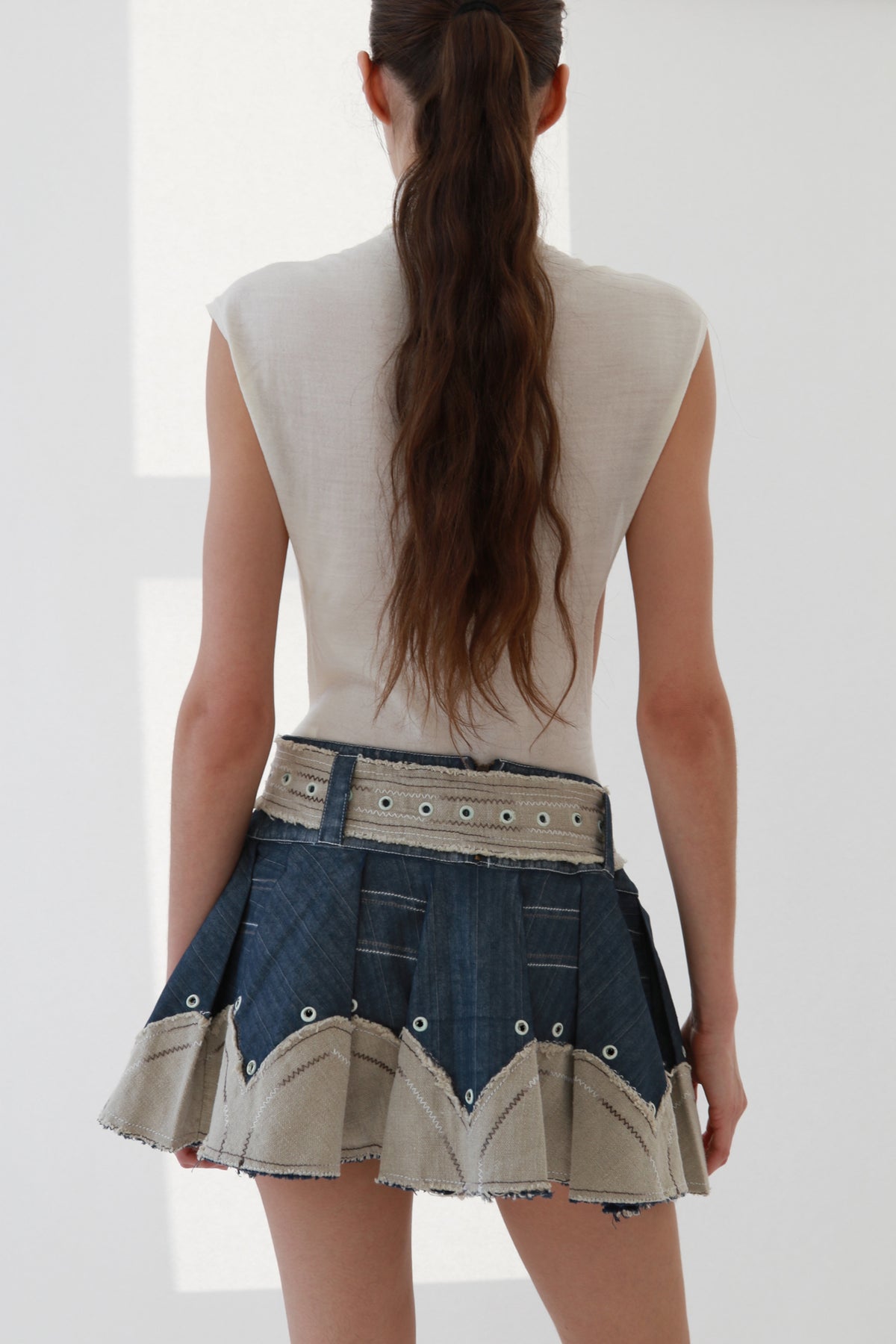 Belted Denim Pleated Mini Skirt with Contrast Trim